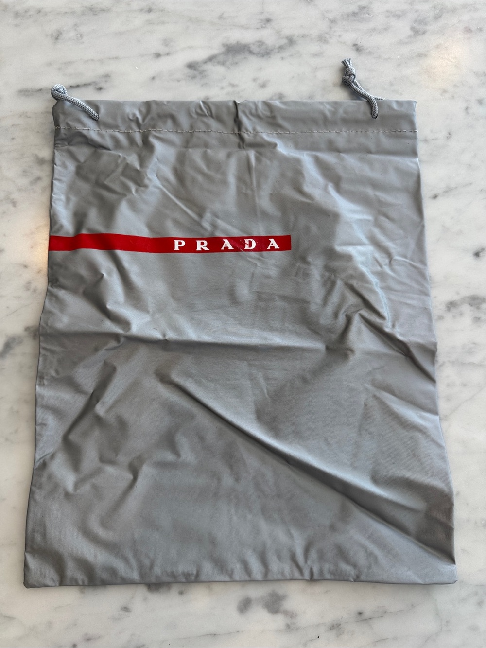 Prada Gray Drawstring Bag with Red Logo - Men's Accessory